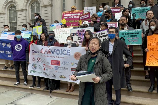 Elizabeth OuYang of the Asian Pacific American VOICE Redistricting Task Force addresses a gathering outside City Hall in Manhattan.